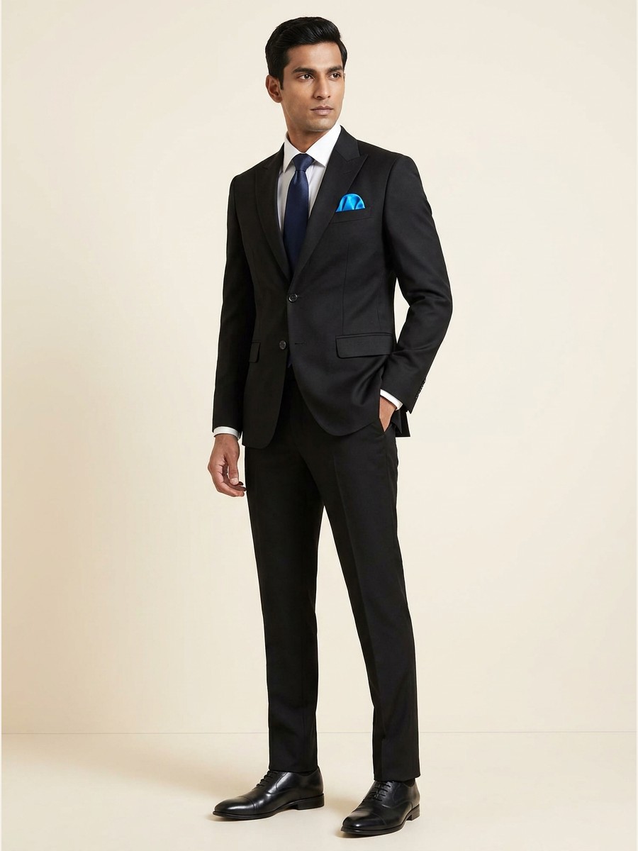 Luxury All-Weather Suiting · Super 120s shade 1 — Charcoal styled as garment