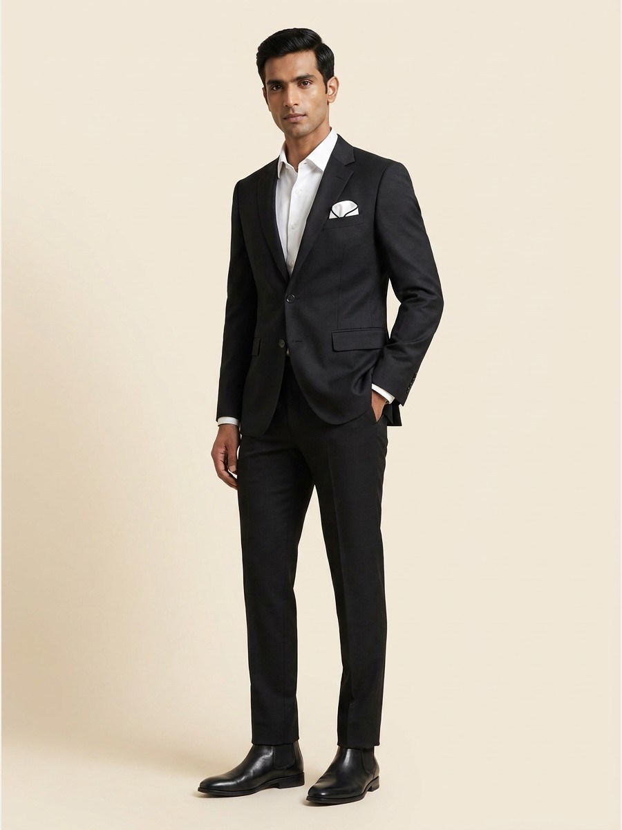 Luxury All-Weather Suiting · Super 120s shade 2 — Charcoal styled as garment