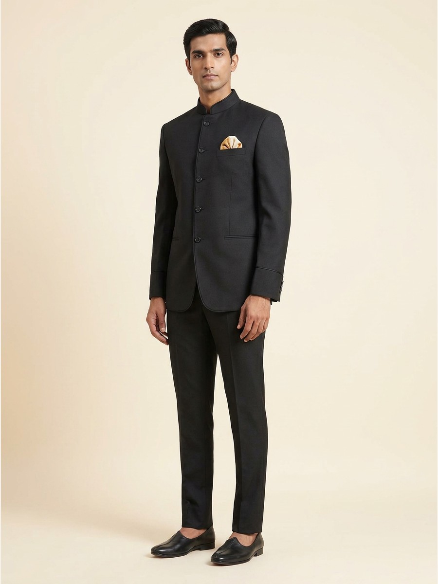 Luxury All-Weather Suiting · Super 120s shade 2 — Charcoal styled as garment