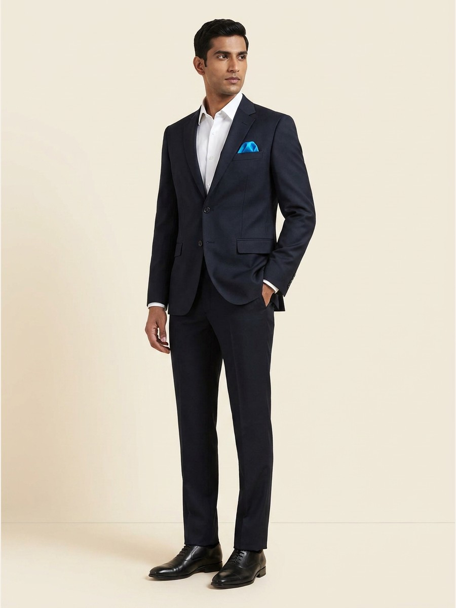 Reserve All-Weather Suiting · Super 140s fabric styled as a garment