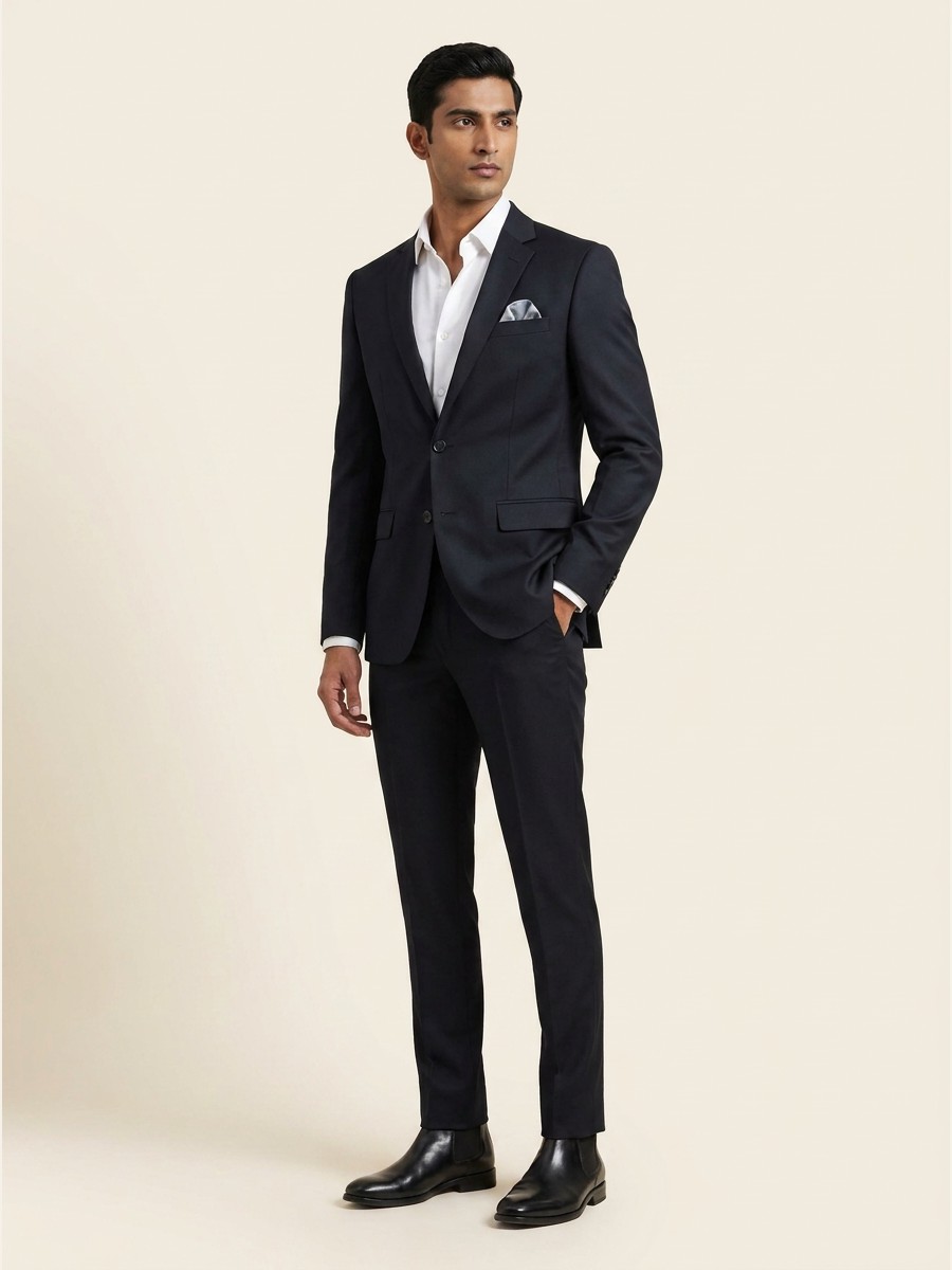 Reserve All-Weather Suiting · Super 140s shade 5 — Navy styled as garment
