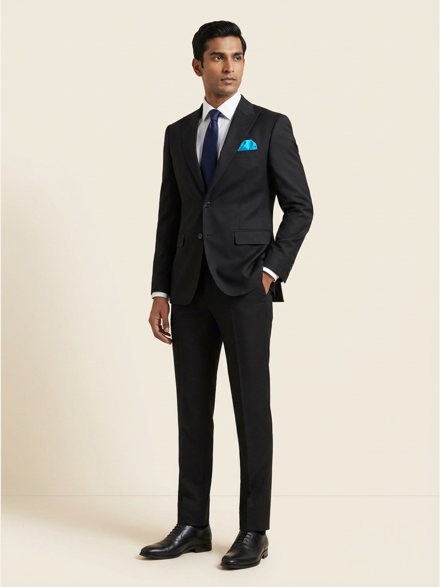 Essential All-Weather Suiting shade 4 — Black styled as garment