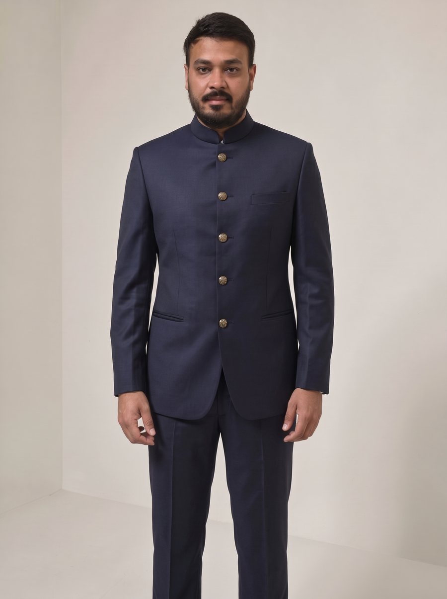 Nitesh Mittal in a midnight navy Jodhpuri bandhgala with gold buttons