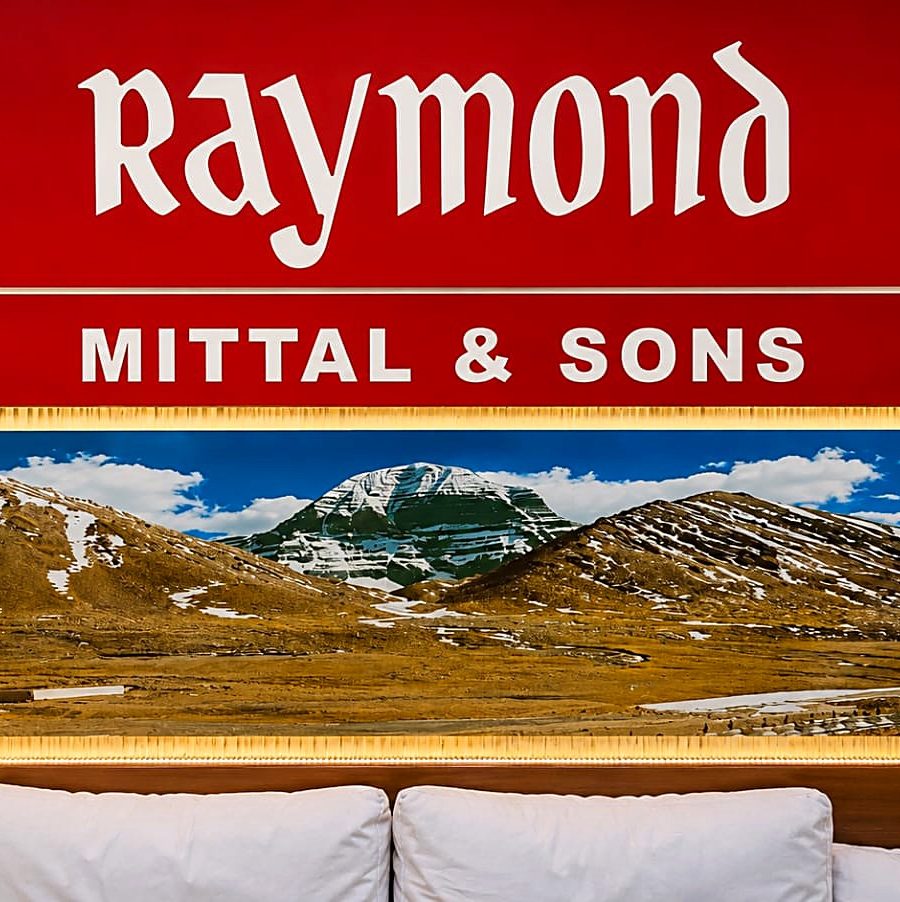 The Raymond and Mittal & Sons board above the gaddi in our Chandni Chowk shop